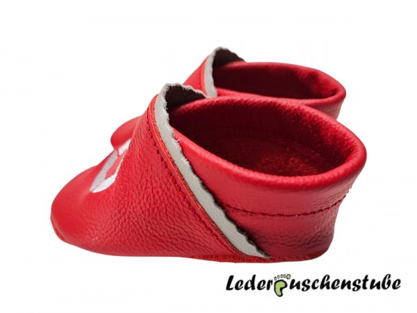 Lederpuschen rot mit Logo Hainbuch seitlich